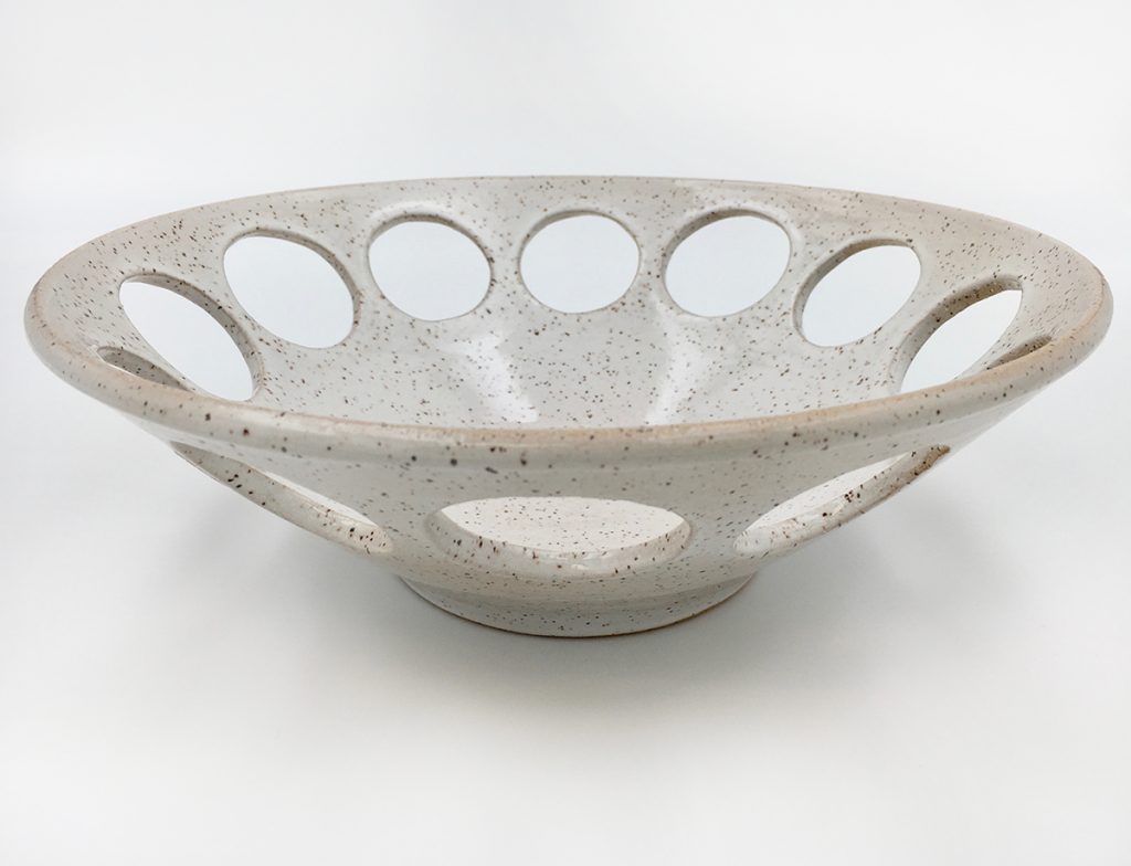 bowl with round cutouts